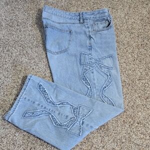 Ashley Mason Light Blue Flare Jeans with Bow Detail